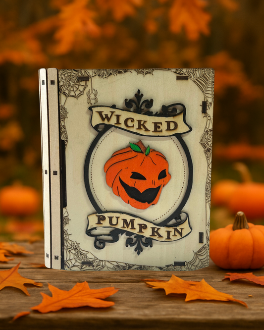 Mehrschichtig gefertigte Holzbox mit Kürbismotiv im Wicked-Pumpkin-Design.
